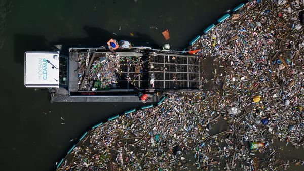 Aerial footage of the Interceptor Tender extracting intercepted plastic