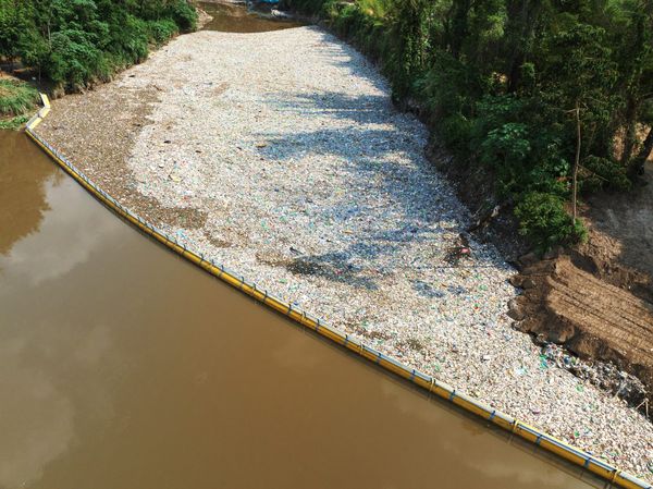 The Ocean Cleanup's Interceptor 006 in Guatemala. The Ocean Cleanup has provided PET caught by this Intercpetor for the production of Coldplay's latest limited edition LP.