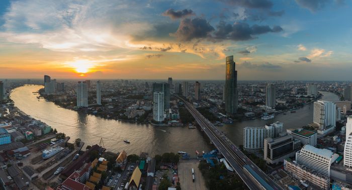 Panorama, aerial view Bangkok river curved with sunset background