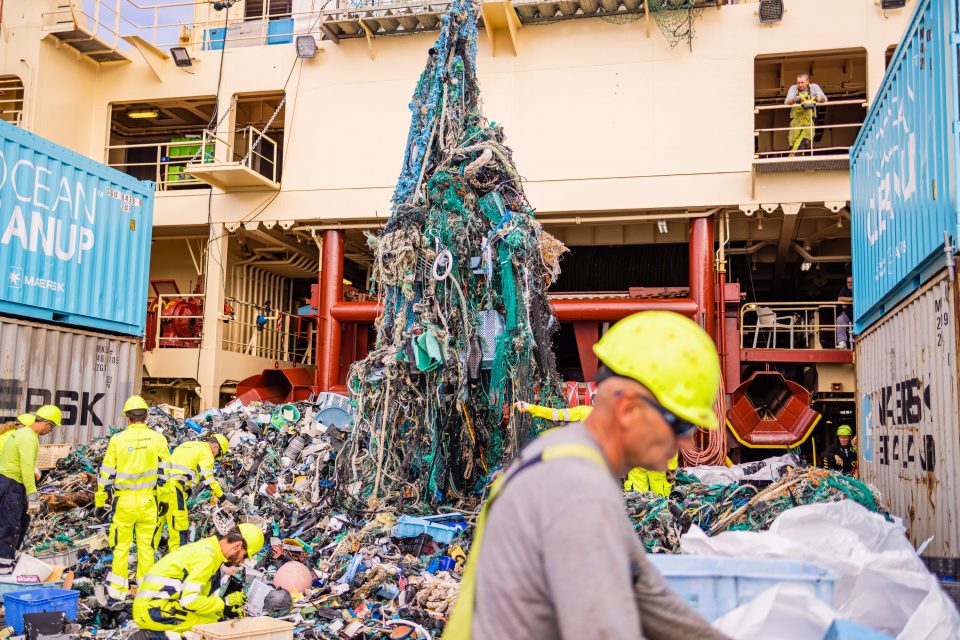 Crew sorting plastic on deck after System 002 extraction, October 2021